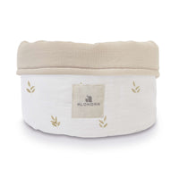 Cesta almacenaje infantil redonda hojas beige · Nandina 614-116