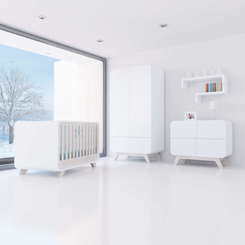 habitación infantil con una estetica elegante y clara