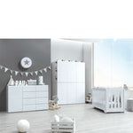 Habitación infantil con armario modular blanco y acabados grises